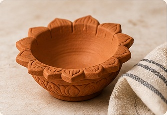 Plain unpainted terracotta diya ready to be cleaned